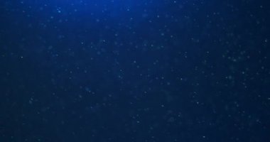 Yüzen mavi bokeh ışığı ve toz parçacıkları