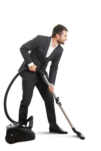 Businessman doing vacuum cleaning — Stock Photo, Image