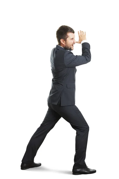 Screaming businessman striding — Stock Photo, Image