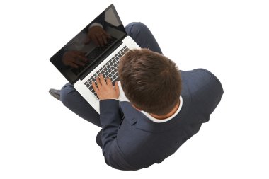 man in black suit with laptop