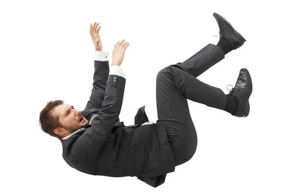 Businessman in black suit falling down — Stock Photo, Image