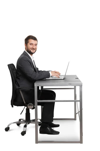 Successful young businessman sitting — Stock Photo, Image