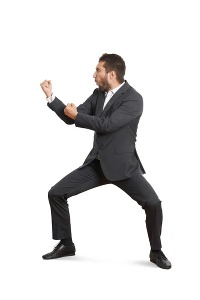 Funny businessman beating his fist — Stock Photo, Image