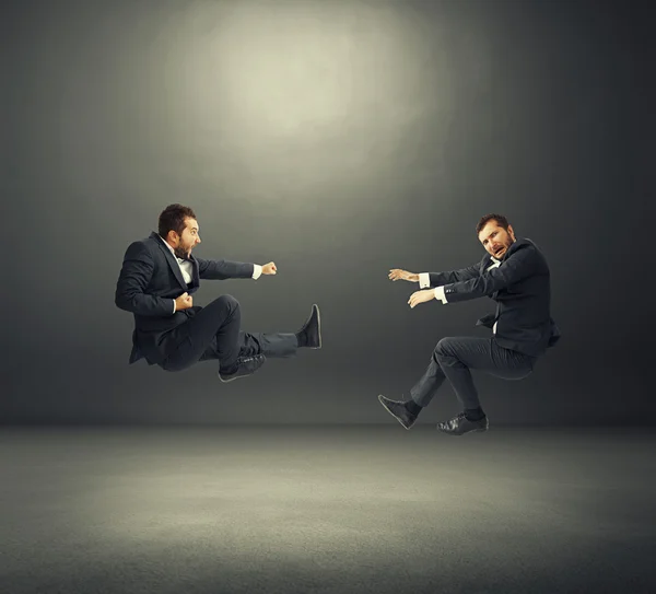 Two young businessmen in fight — Stock Photo, Image