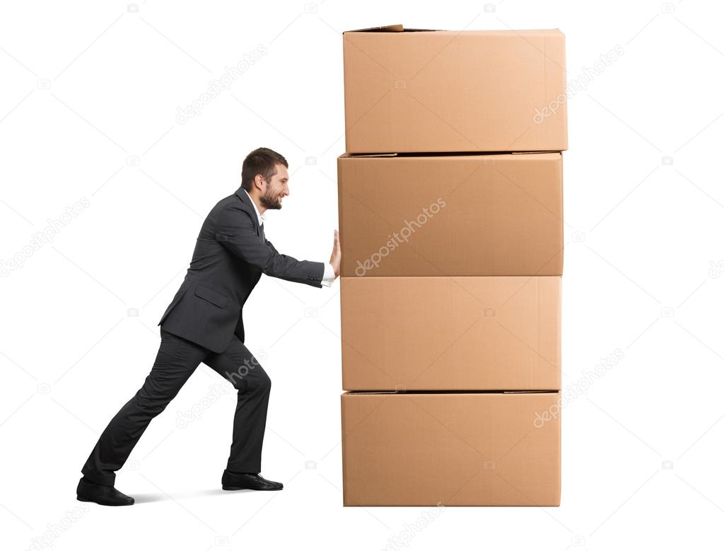 man moving cardboard boxes