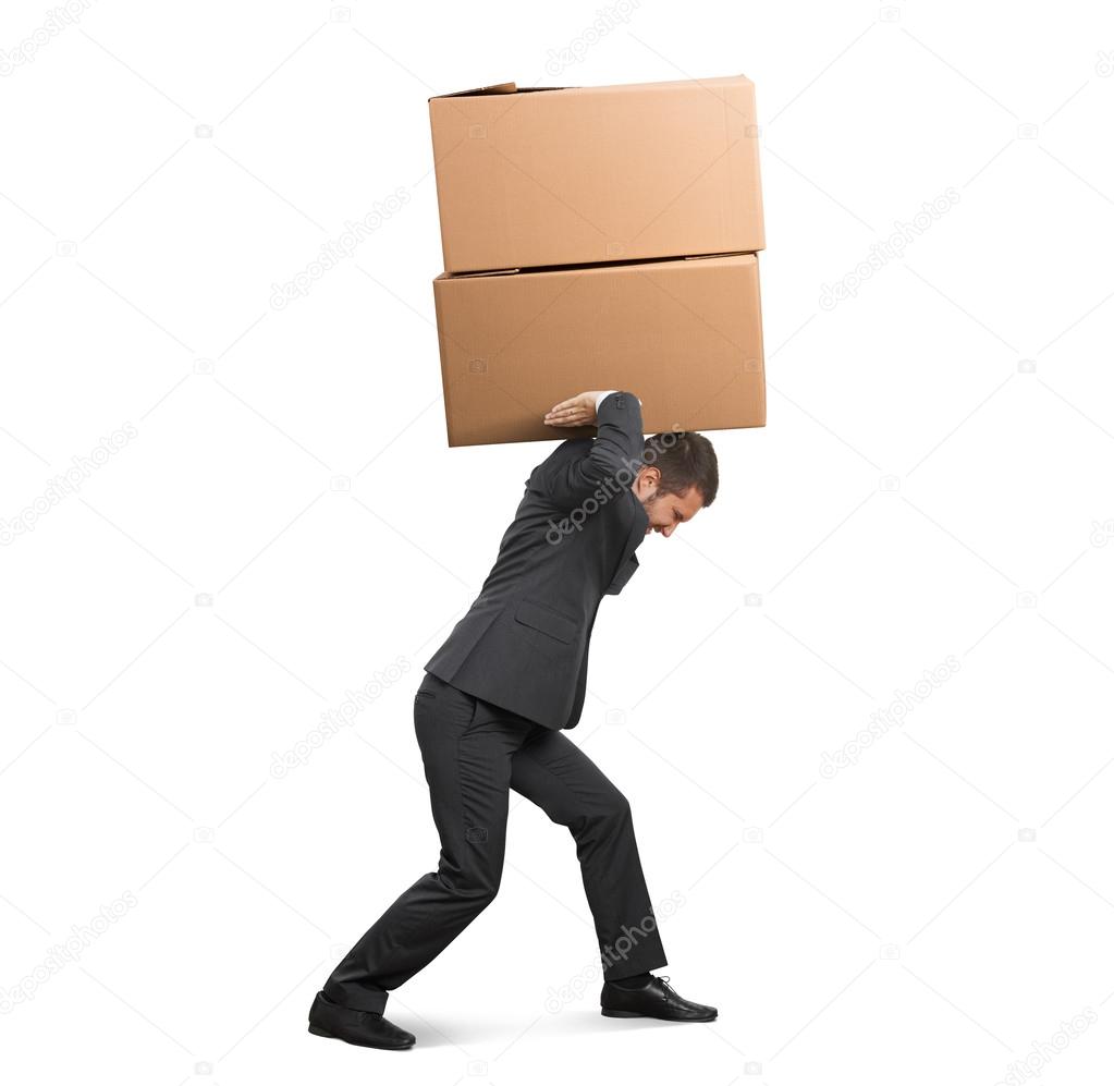 tired businessman carrying boxes