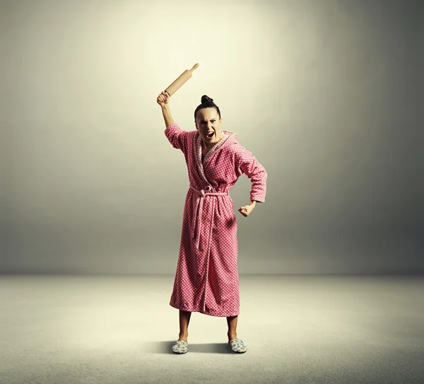 Housewife holding rolling pin — Stock Photo, Image