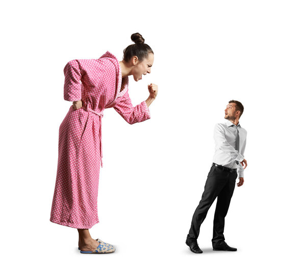 emotional woman screaming at small scared man