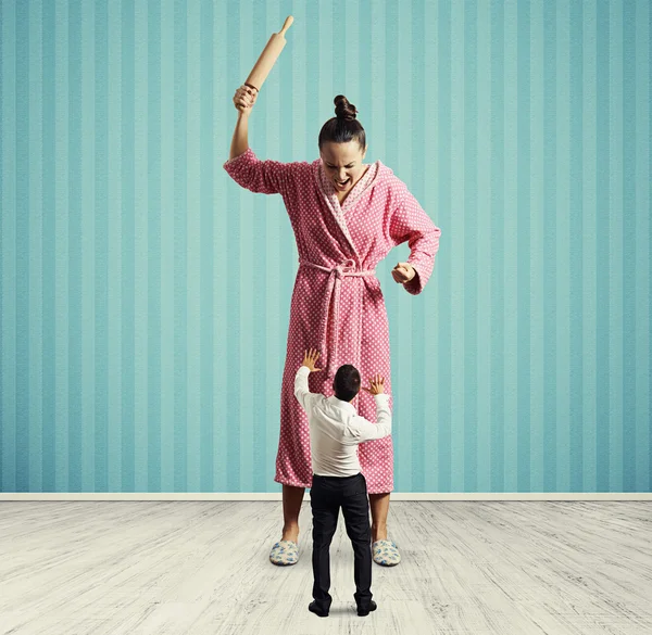 Housewife with rolling pin screaming — Stock Photo, Image