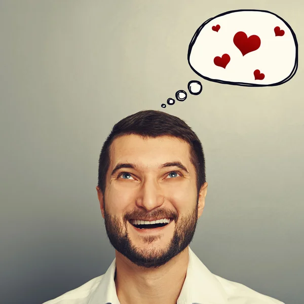 Man with speech bubble and red hearts — Stock Photo, Image