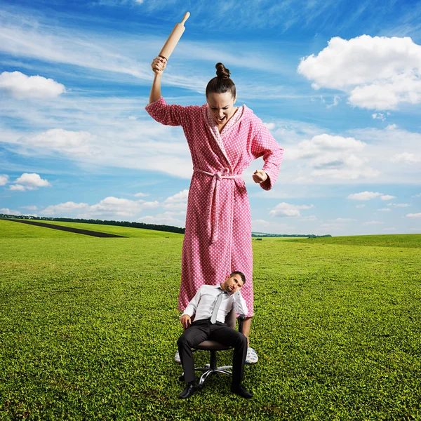 Woman with rolling pin screaming — Stock Photo, Image