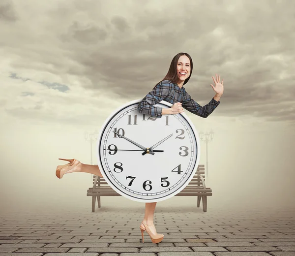 Woman with big white clock running — Stock Photo, Image