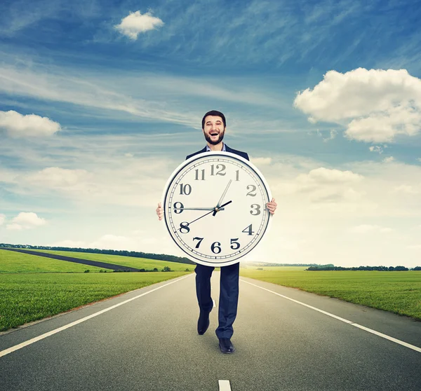 Laughing man walking on the road — Stock Photo, Image