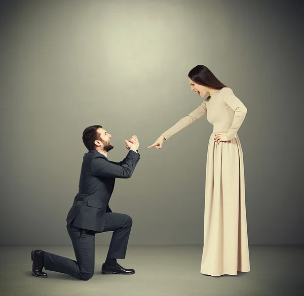 Emotional couple over grey — Stock Photo, Image