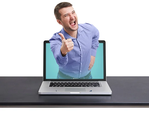 Happy man got out of the laptop — Stock Photo, Image