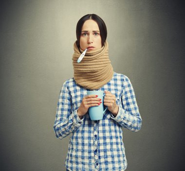 woman in scarf have a flu clipart