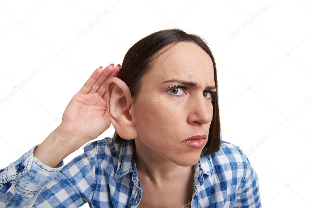 woman with one big ear listening