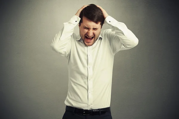 Hombre cremoso emocional en camisa blanca —  Fotos de Stock