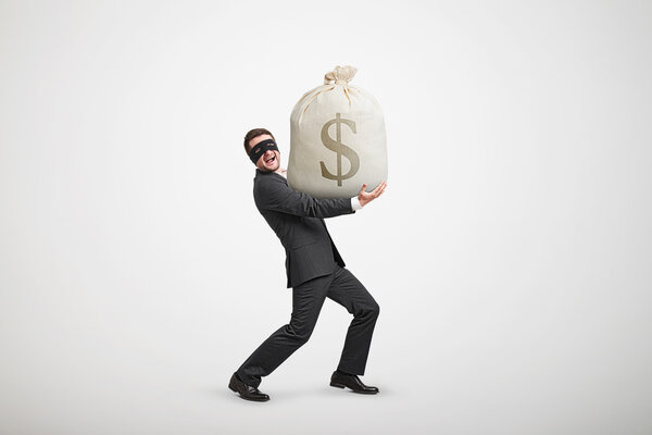 man in formal wear and black mask