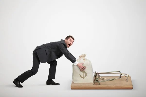 Man reaching his hands to take bag — Stock Photo, Image