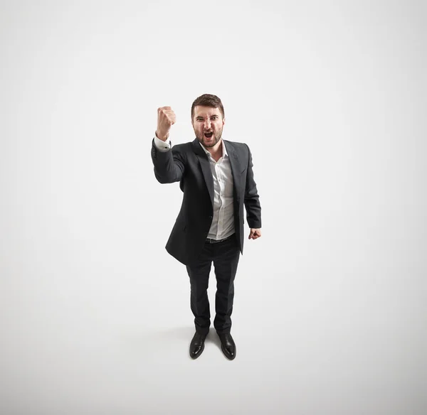 Screaming man showing fist — Stock Photo, Image