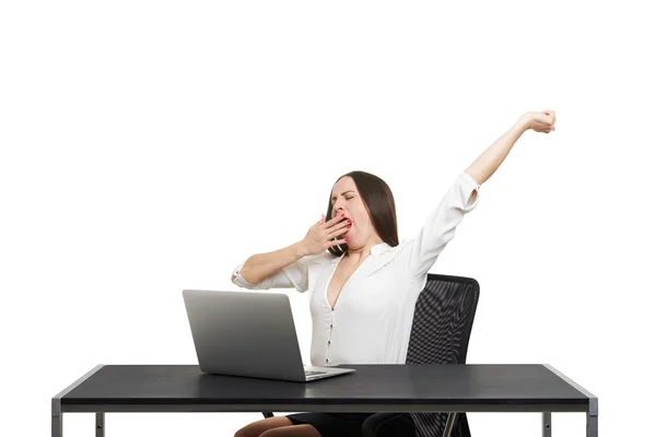 Tired woman sitting with laptop — Stock Photo, Image