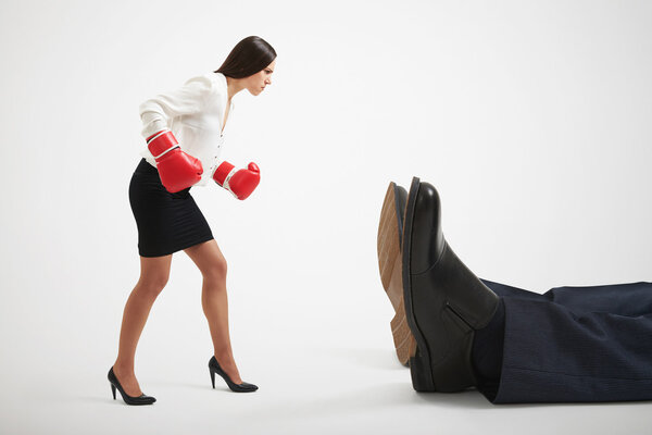 woman looking at big knocked out man