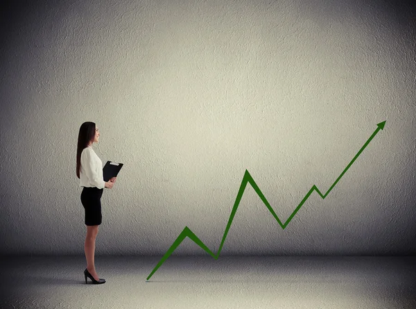 Woman holding folder and looking — Stock Photo, Image