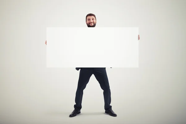 Man holding empty banner — Stock Photo, Image