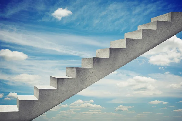 Concrete stairs over blue sky — Stok fotoğraf