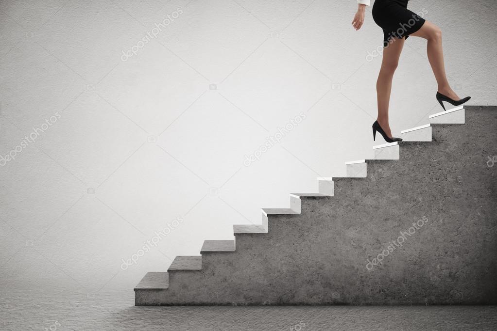 woman walking up stairs