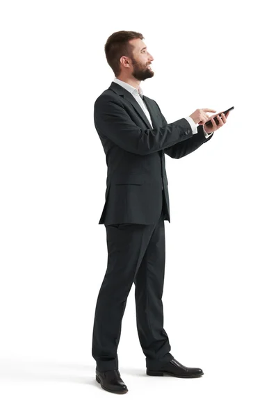 Man in formal wear using smartphone — Stock Photo, Image