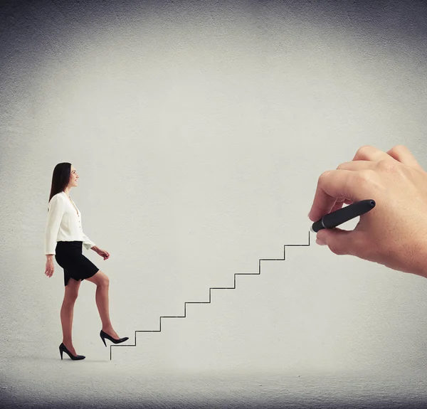 Woman following up stairs — Stock Photo, Image