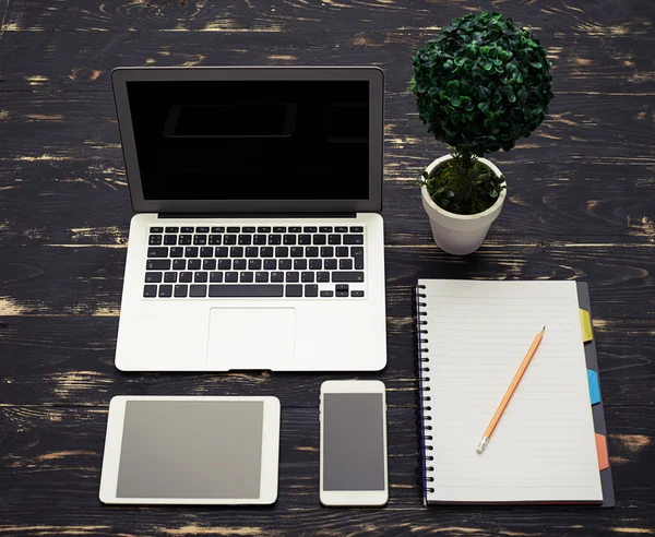 Wooden table with office accessories — Stock Photo, Image