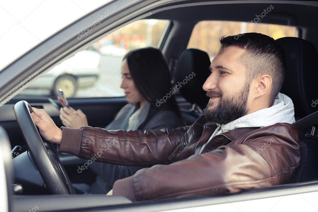 young man driving the car