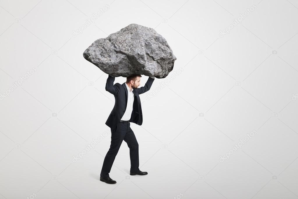 carrying big stone