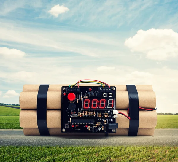 Bomb with timer on the road at outdoor — Stock Photo, Image