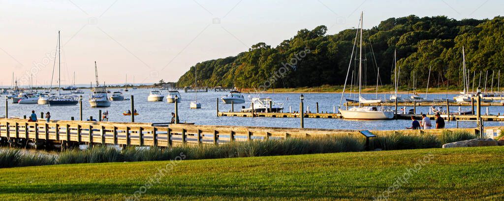 Port Jefferson, New York, USA - 7 September 2015: Looking out at the Long Island Sound from Port JEfferson Village park.