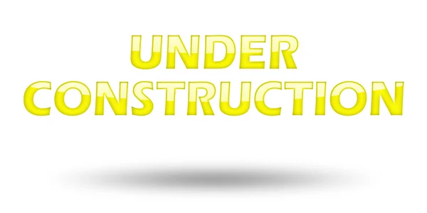 Text Under Construction with yellow letters and shadow. — Stock Photo, Image