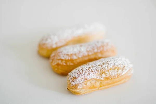 Home Made Cake Eclairs Brown Table Sugar Powder Stuffed Eclair — Stock Photo, Image