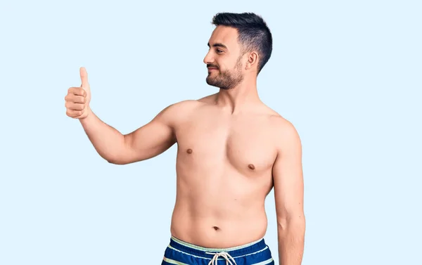 Young Handsome Man Wearing Swimwear Looking Proud Smiling Doing Thumbs — Stock Photo, Image
