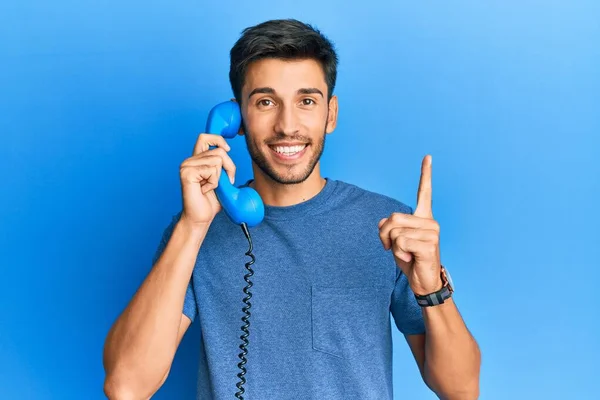 Young Handsome Man Speaking Vintage Telephone Smiling Idea Question Pointing — Stock Photo, Image