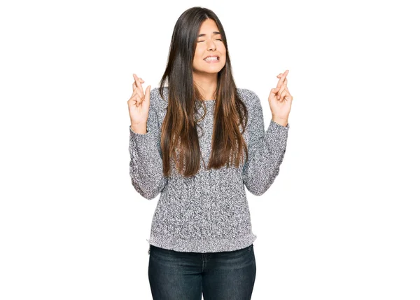 Young Brunette Woman Wearing Casual Winter Sweater Gesturing Finger Crossed — Stock Photo, Image