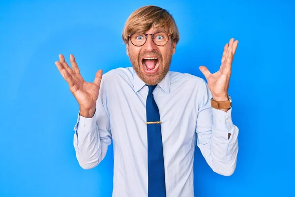 Young Blond Man Wearing Business Clothes Glasses Celebrating Crazy Amazed — Stock Photo, Image