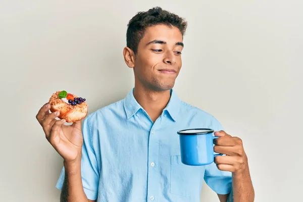 Young Handsome African American Man Drinking Coffee Eating Pastry Smiling — Stock Photo, Image
