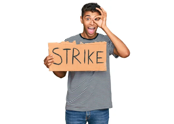 Young Handsome African American Man Holding Strike Banner Cardboard Smiling — Stock Photo, Image