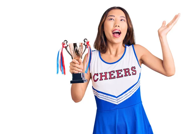 Youn Beautiful Asian Girl Wearing Cheerleader Uniform Holding Champion Trophy — Stock Photo, Image