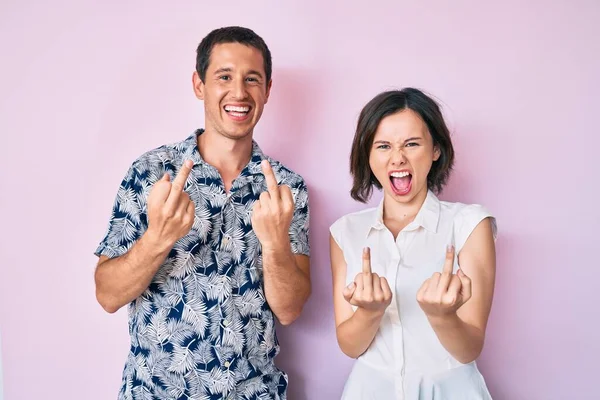 Beautiful Couple Wearing Casual Clothes Showing Middle Finger Doing Fuck — Fotografia de Stock