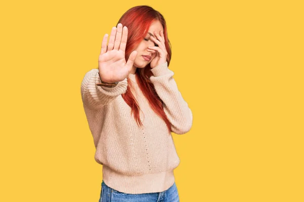 Young Redhead Woman Wearing Casual Winter Sweater Covering Eyes Hands — Stock Photo, Image