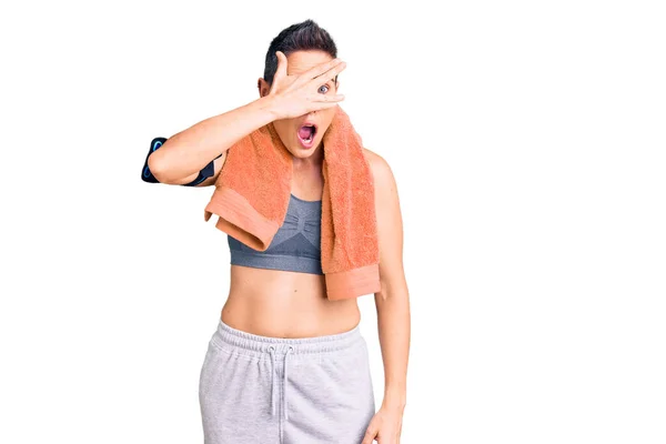 Young Woman Short Hair Wearing Sportswear Towel Using Smartphone Peeking — Stock Photo, Image